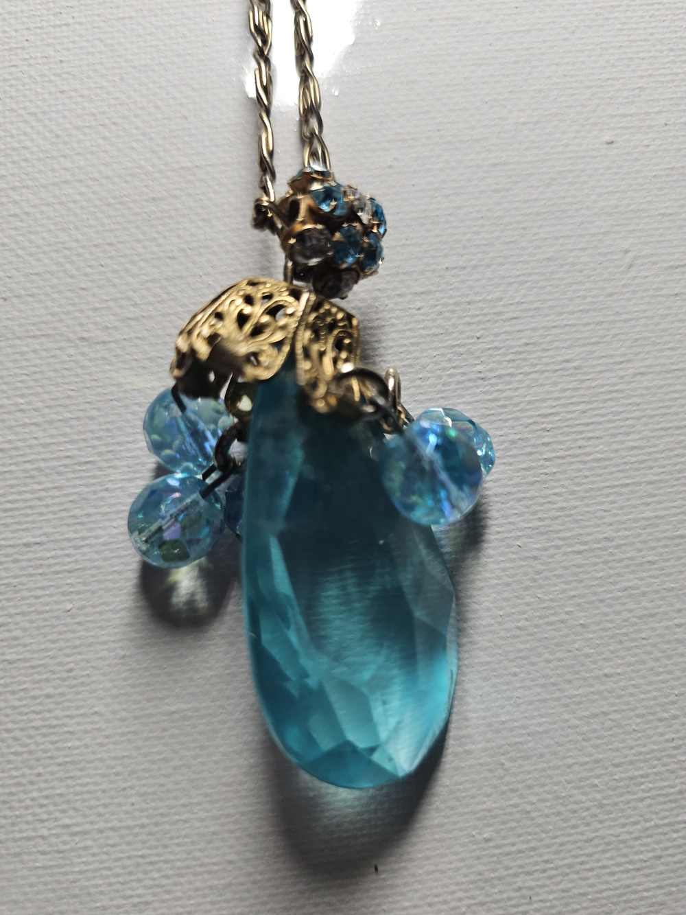Gold-Tone Necklace with Teardrop Blue Crystal Pendant